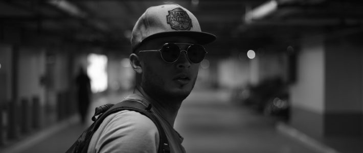 black and white shot of a male traveler
